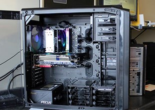 Image of a computer built by CPS with a visible RAM card.