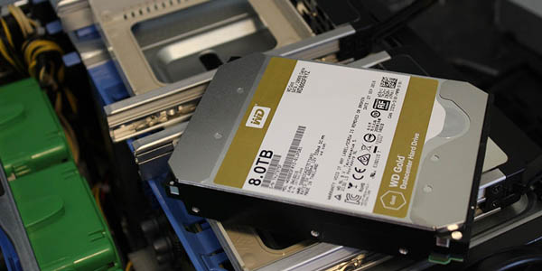 Image of a hard drive resting on a server to reference how Creative Programs and Systems provides data recovery services.